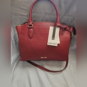 Brand new Nine West hand bag in Claret